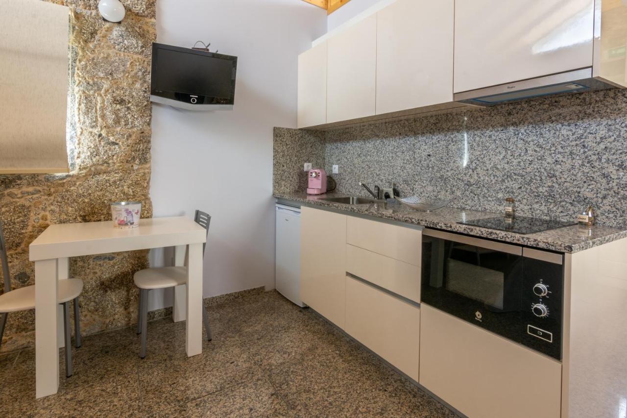 Aldeamento Casas Do Alto Do Vez Apartment Balouta Luaran gambar