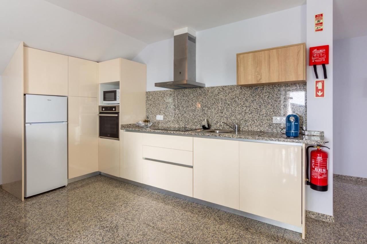 Aldeamento Casas Do Alto Do Vez Apartment Balouta Luaran gambar